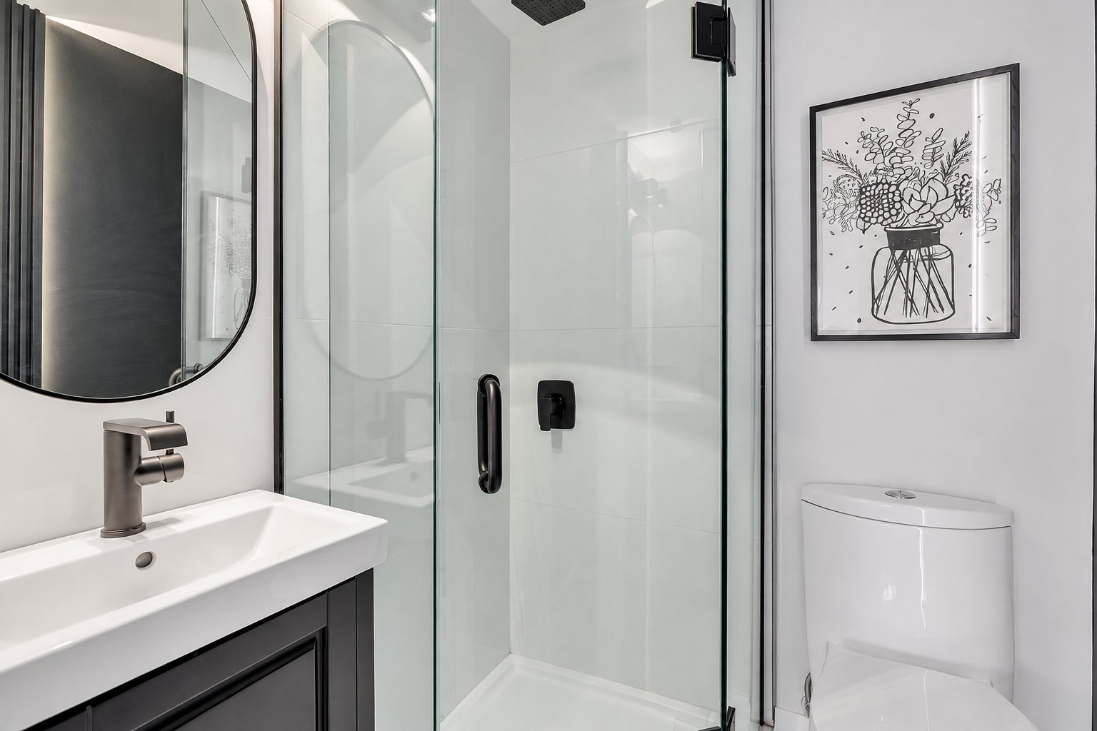 Bathroom after renovation, glass shower with rainfall showerhead